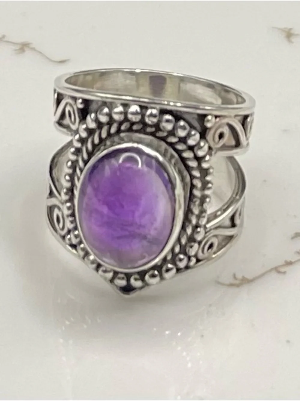 Vtg  SS  oval, amethyst statement, ring size 7 Boho wide band.   8.34  grams